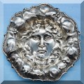 S31. Sterling silver repousse Maenad dish. 